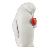 Porcelain sculpture "Colby – Penguin protector" with red heart LLADRÓ