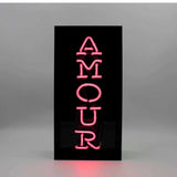 Neon luminoso in vetro "Amour" con box acrilico nero